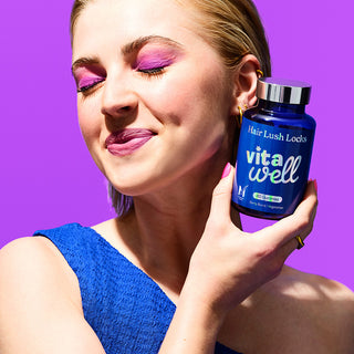 Women holding hair lush locks supplement