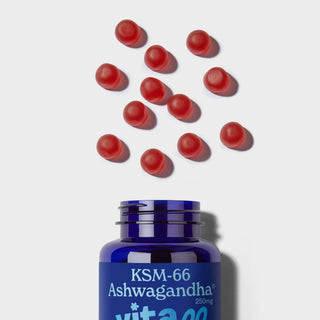 Vitawell Ashwagandha Gummies pouring out of a bottle