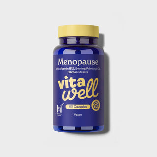 A bottle of 'Vitawell' menopause capsules with the text indicating Vitamin B12, Evening Primrose Oil, and herbal extracts as ingredients. The bottle is labeled with '60 capsules' and 'Vegan'.