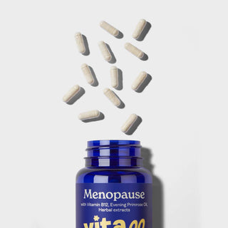 Vitawell Menopause Support Capsules pouring out of the bottle