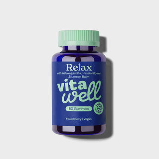 A bottle of 'Vitawell' Relax gummies with mixed berry flavour. The label indicates that there are 50 gummies inside and the product is vegan-friendly.