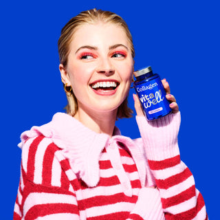 Image of woman holding a bottle of Collagen tablets