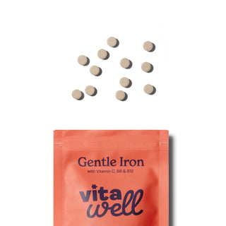 Vitawell Gentle Iron supplement packaging with scattered tablets 