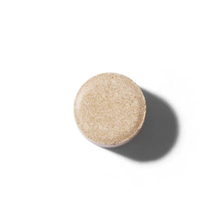 Round beige Lion's mane extract tablet 